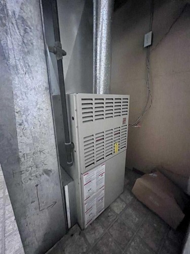608 9 Avenue West, Hanna, AB - Indoor Photo Showing Basement
