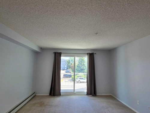1206-604 8 Street Sw, Airdrie, AB - Indoor Photo Showing Other Room