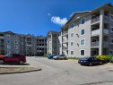 1206-604 8 Street Sw, Airdrie, AB  - Outdoor With Balcony With Facade 