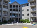 1206-604 8 Street Sw, Airdrie, AB  - Outdoor With Balcony With Facade 