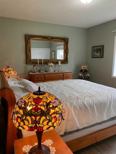 79 Park Place West, Brooks, AB - Indoor Photo Showing Bedroom