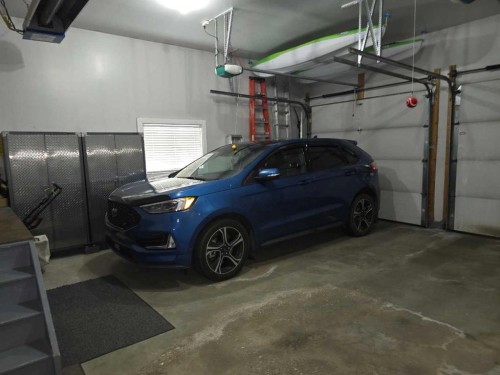 79 Park Place West, Brooks, AB - Indoor Photo Showing Garage