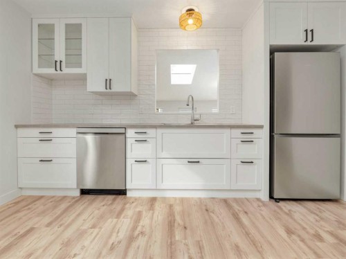 1818 10A Street, Coaldale, AB - Indoor Photo Showing Kitchen With Upgraded Kitchen