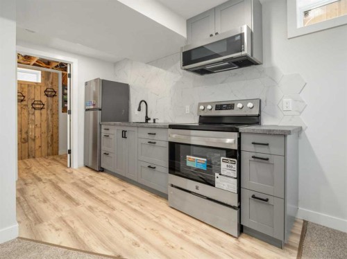 1818 10A Street, Coaldale, AB - Indoor Photo Showing Kitchen With Upgraded Kitchen