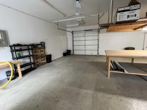 1818 10A Street, Coaldale, AB - Indoor Photo Showing Garage