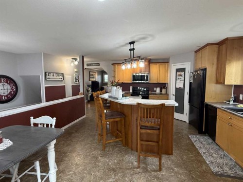 502 Fox Lake Trail, Hanna, AB - Indoor Photo Showing Kitchen With Double Sink