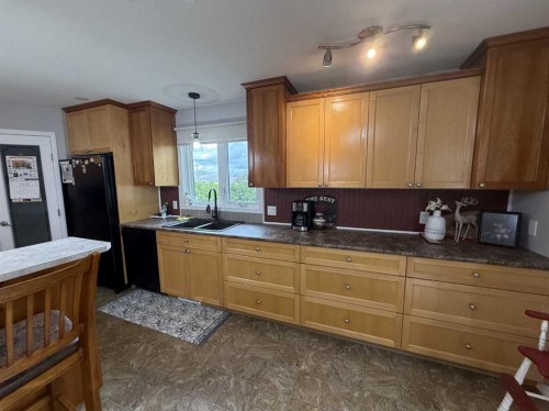502 Fox Lake Trail, Hanna, AB - Indoor Photo Showing Kitchen With Double Sink
