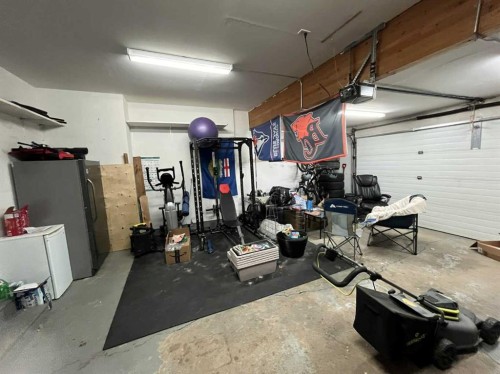 3930 Harmony Place, Taber, AB - Indoor Photo Showing Garage