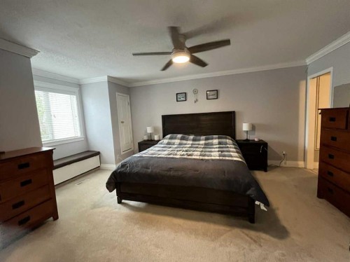 3930 Harmony Place, Taber, AB - Indoor Photo Showing Bedroom