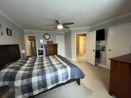 3930 Harmony Place, Taber, AB - Indoor Photo Showing Bedroom