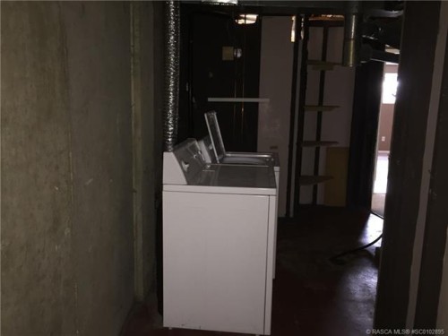 59 Hunts Drive, Drumheller, AB - Indoor Photo Showing Laundry Room