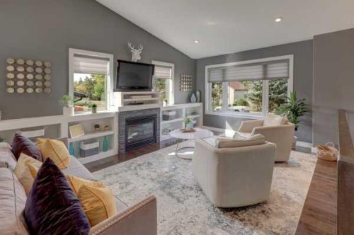 96 Poplar Street, Drumheller, AB - Indoor Photo Showing Living Room With Fireplace