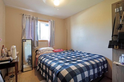 60 Pleasant Park Road West, Brooks, AB - Indoor Photo Showing Bedroom