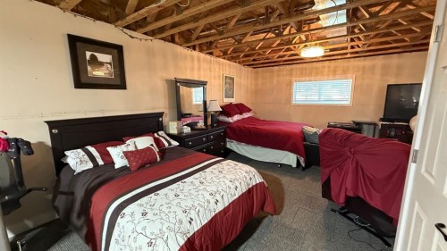 219 1 Avenue East, Youngstown, AB - Indoor Photo Showing Bedroom