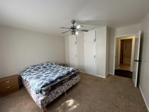 126 Harris Road, Taber, AB - Indoor Photo Showing Bedroom
