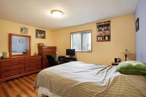 144 Upland Boulevard, Brooks, AB - Indoor Photo Showing Bedroom