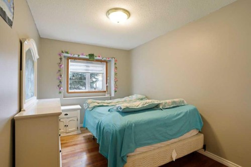 144 Upland Boulevard, Brooks, AB - Indoor Photo Showing Bedroom