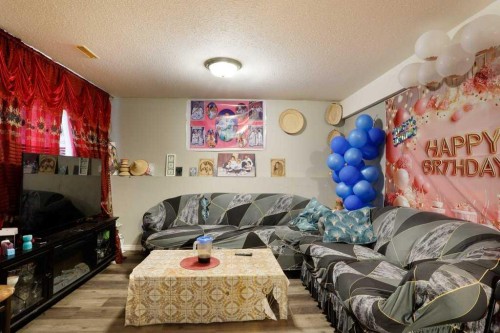 144 Upland Boulevard, Brooks, AB - Indoor Photo Showing Living Room