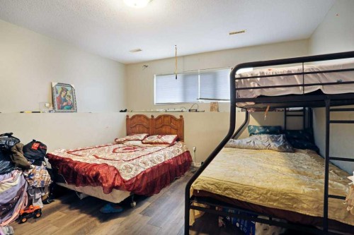 144 Upland Boulevard, Brooks, AB - Indoor Photo Showing Bedroom