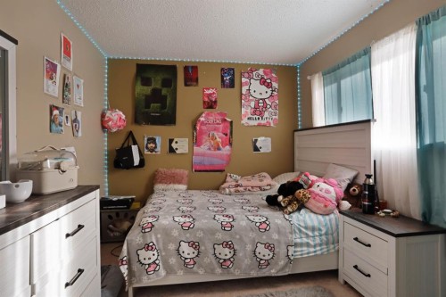 1120 2 Avenue East, Brooks, AB - Indoor Photo Showing Bedroom