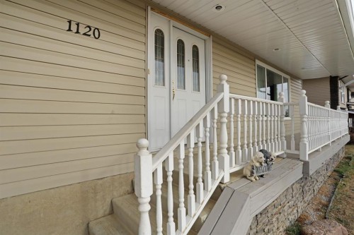 1120 2 Avenue East, Brooks, AB - Outdoor With Deck Patio Veranda With Exterior