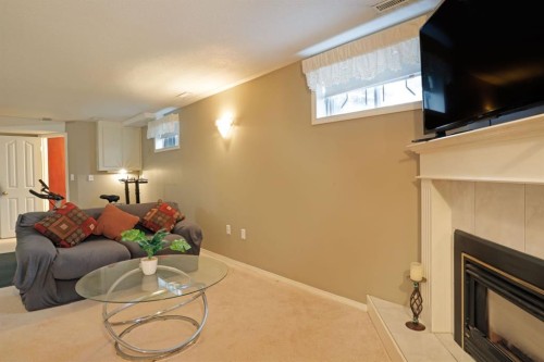 1120 2 Avenue East, Brooks, AB - Indoor With Fireplace