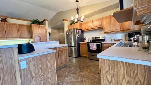 30371 Range Road 143, Hanna, AB - Indoor Photo Showing Kitchen With Double Sink