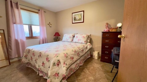 30371 Range Road 143, Hanna, AB - Indoor Photo Showing Bedroom