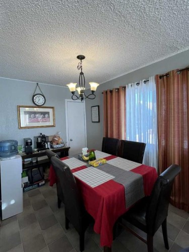 4915 57 Avenue, Taber, AB - Indoor Photo Showing Dining Room