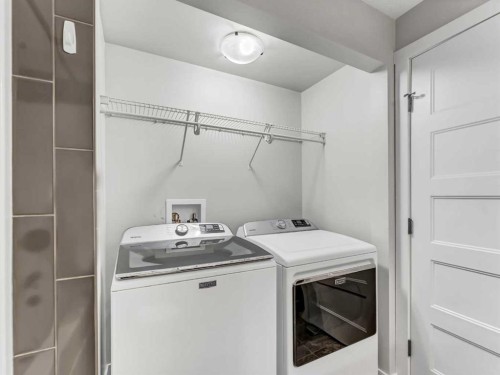 24 Upland Place West, Brooks, AB - Indoor Photo Showing Laundry Room
