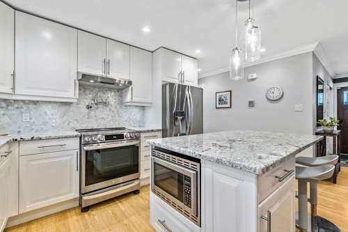 269 Windermere Road Sw, Calgary, AB - Indoor Photo Showing Kitchen With Upgraded Kitchen