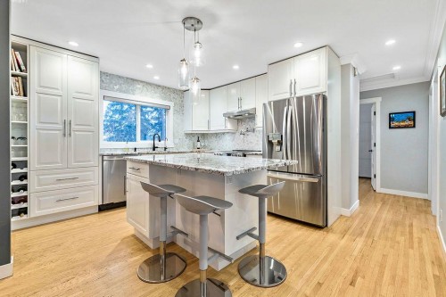 269 Windermere Road Sw, Calgary, AB - Indoor Photo Showing Kitchen With Upgraded Kitchen