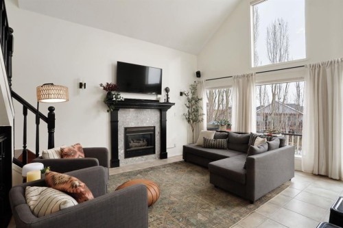 87 White Pelican View, Lake Newell Resort, AB - Indoor Photo Showing Living Room With Fireplace