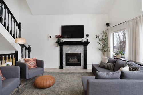 87 White Pelican View, Lake Newell Resort, AB - Indoor Photo Showing Living Room With Fireplace