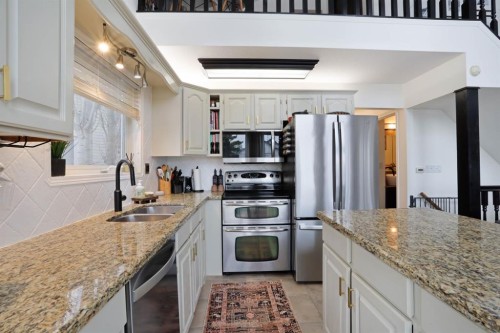 87 White Pelican View, Lake Newell Resort, AB - Indoor Photo Showing Kitchen With Stainless Steel Kitchen With Double Sink