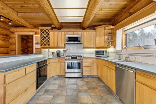 5544 Township Road 302, Rural Mountain View County, AB - Indoor Photo Showing Kitchen With Double Sink