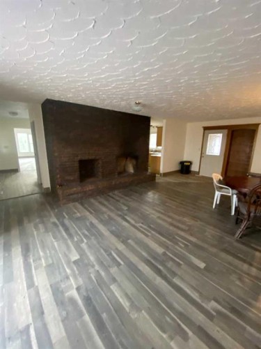 75 Greenbrook Road East, Brooks, AB - Indoor With Fireplace