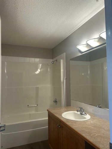 307-4403 67A Avenue, Olds, AB - Indoor Photo Showing Bathroom