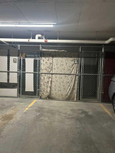 307-4403 67A Avenue, Olds, AB - Indoor Photo Showing Garage