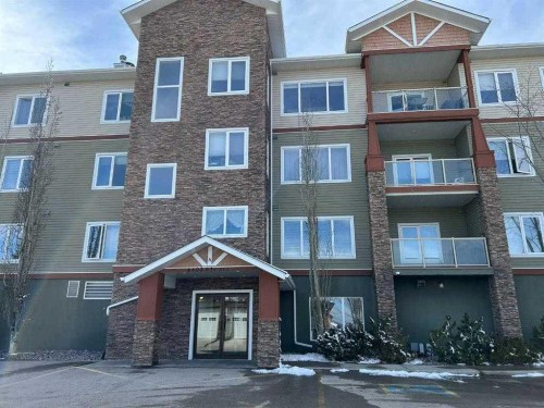 307-4403 67A Avenue, Olds, AB - Outdoor With Facade