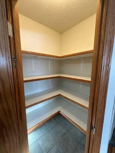 101 Wilkins Place, Hanna, AB - Indoor With Storage
