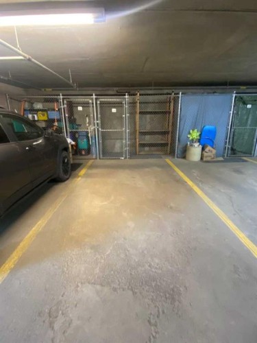 103-680 Cassils Road West, Brooks, AB - Indoor Photo Showing Garage
