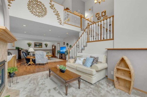 18 Asmundsen Close, Red Deer, AB - Indoor Photo Showing Living Room With Fireplace