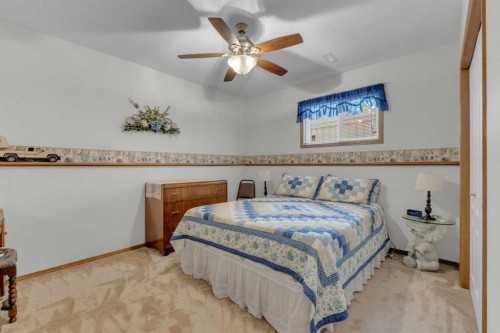 18 Asmundsen Close, Red Deer, AB - Indoor Photo Showing Bedroom