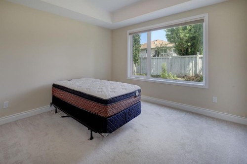 12 Garden Way, Drumheller, AB - Indoor Photo Showing Bedroom
