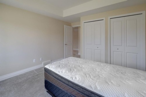12 Garden Way, Drumheller, AB - Indoor Photo Showing Bedroom