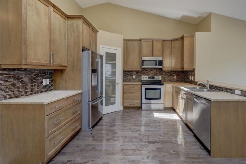 12 Garden Way, Drumheller, AB - Indoor Photo Showing Kitchen With Stainless Steel Kitchen With Double Sink