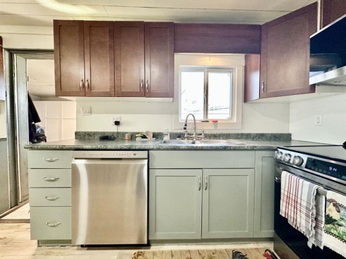 168 2 Avenue West, Tilley, AB - Indoor Photo Showing Kitchen With Stainless Steel Kitchen With Double Sink