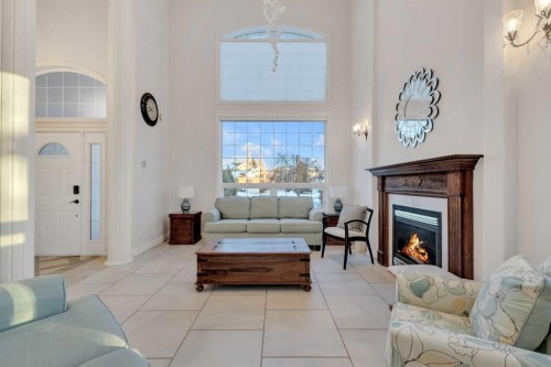 25 Ashmore Close, Red Deer, AB - Indoor Photo Showing Living Room With Fireplace