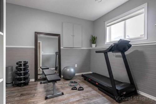263 Upland Avenue, Brooks, AB - Indoor Photo Showing Gym Room